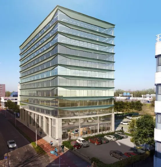 Modern kantoorgebouw aan de Marten Meesweg met glazen gevel en omliggende parkeerplaatsen.